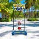 Niantic's promotional pic for Stufful Community Day, the pink monster on a lovely beach.